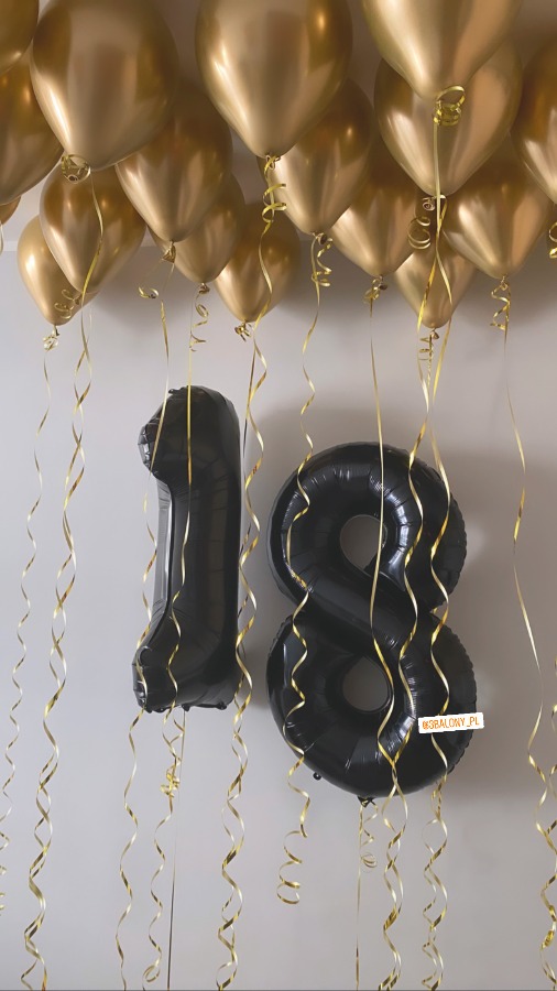 Czarne cyfry 1 i 8 ze złotymi balonami z helem