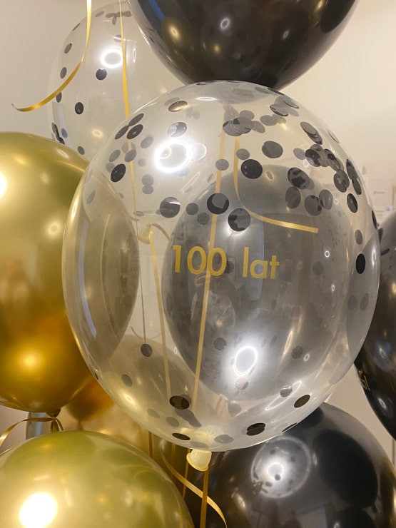 Przezroczysty balon ze złotym napisem 100 lat